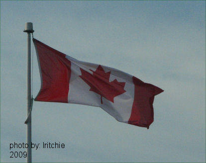 canadian flag waving in the wind